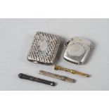 Two silver vesta cases, a white metal tooth pick, a white metal needle case and a yellow metal