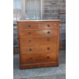 A late 19th century mahogany chest of two short and four long graduated drawers with knob handles,