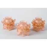 A set of three pink lampwork shades and three art deco frosted shades