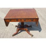 A 19th century mahogany sofa table, fitted two drawers with Prince of Wales feathers ring handles,