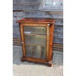 A Victorian figured walnut and line inlaid music cabinet enclosed glazed panel door, on bracket