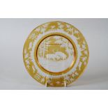 A 19th century Bohemian yellow flashed and engraved plate with rutting stags design, 10 3/4" dia