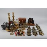 A pair of brass turned candlesticks, 10" high, a quantity of horse brasses, opera glasses,