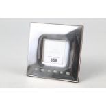 A silver "Concorde" photo frame, 4 3/4" square