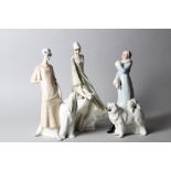 A Royal Doulton Reflections figure, "A Winter Walk", 12 1/4" high, and two companion figures, "
