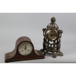 An oak cased mantel clock with white enamel dial and Arabic numerals, 7 3/4" high, and an anodised