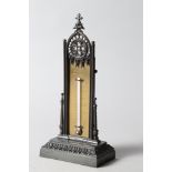 A 19th century bronze "Gothic" desk thermometer, 9" high