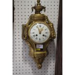 A 19th century ormolu cased wall clock with striking movement, stamped Medialle d'Argent 1889",