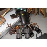 A pair of R E L Canada 7x50 binoculars, in case, another pair of binoculars, a Kodak Six-20 Junior