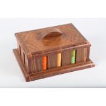 An Art Deco walnut and inlaid gaming chip/counter stand with ten sets of counters, 9 1/2" wide