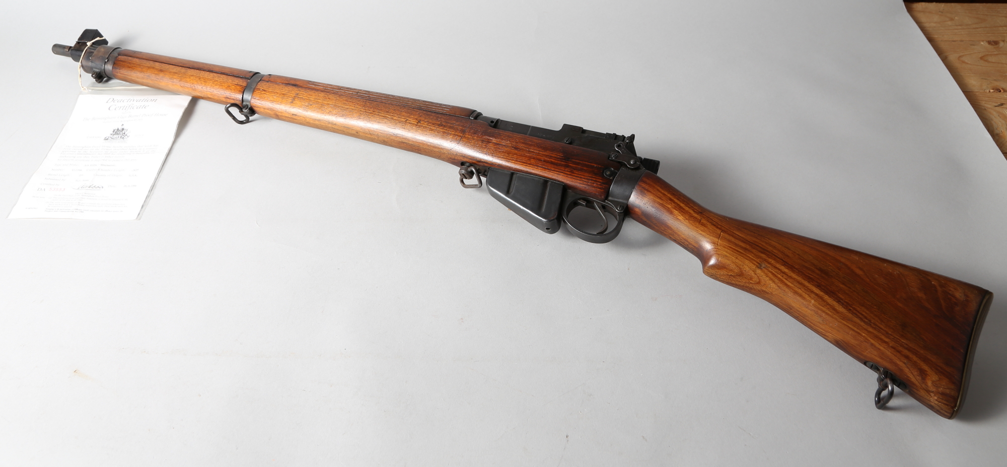 An Enfield bolt-action .303 rifle, 46" overall (deactivated with paperwork)