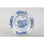 A mid 18th century delft blue and white plate with basket of flower decoration, 10 1/2" dia (