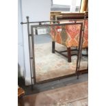 A wall mirror, in wrought iron frame, 23" square