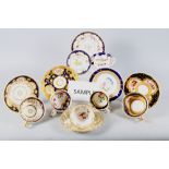 A selection of 19th century English floral decorated cabinet cups and saucers