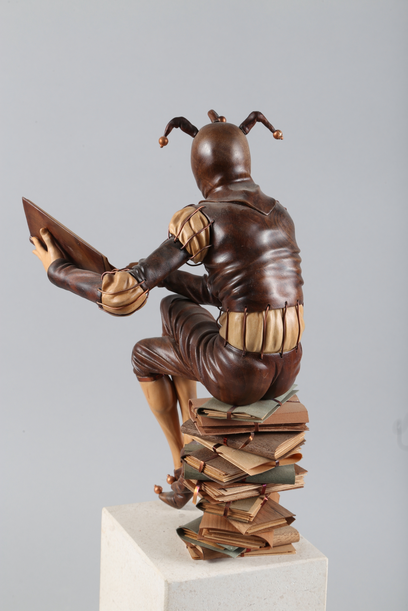 † Ian Norbury: a carved lime and other woods with copper figure, "The Bureaucrat", 11" high, on - Bild 4 aus 7