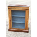 A 19th century walnut and banded display bookcase enclosed single glazed door, on block base, 30"
