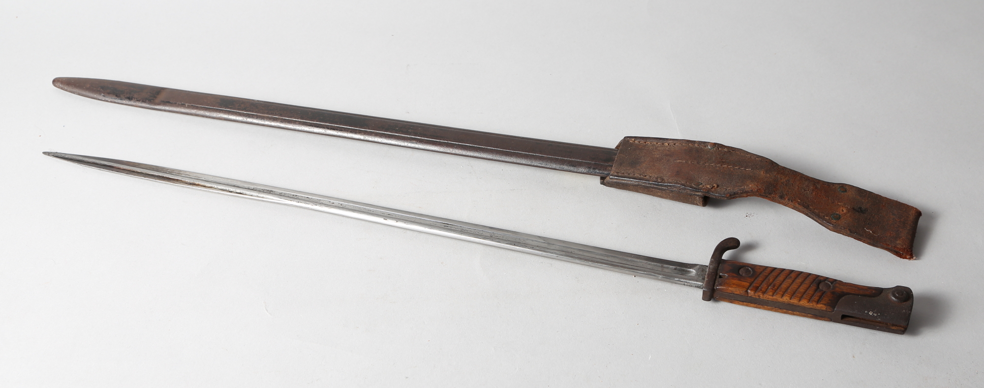A late 19th century German Seitengewehr Mauser bayonet, stamped Erfuto to Ricasso, with metal