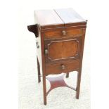 A 19th century mahogany flap top washstand, fitted cupboard and drawer, on chamfered supports, 15"