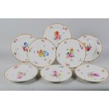 A set of eight Copenhagen dishes, decorated floral sprays and gilt borders, 8 1/2" dia