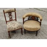 A late 19th century walnut and inlaid tub chair, on turned and castored supports