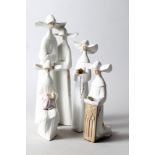 Four Lladro "nun" figures, tallest 13" high (three boxed)