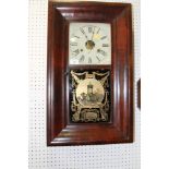 An Enfield oak cased mantel clock, 8 3/4" high, a Majak glass cased mantel clock, 7 1/2" high, and a