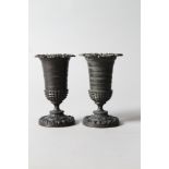 A pair of 19th century "bronze" vases with flared acanthus leaf rims, 5" high