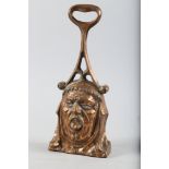 A 19th century cast bronze monk's head doorstop with pierced Gothic arch handle, 15 1/4" high