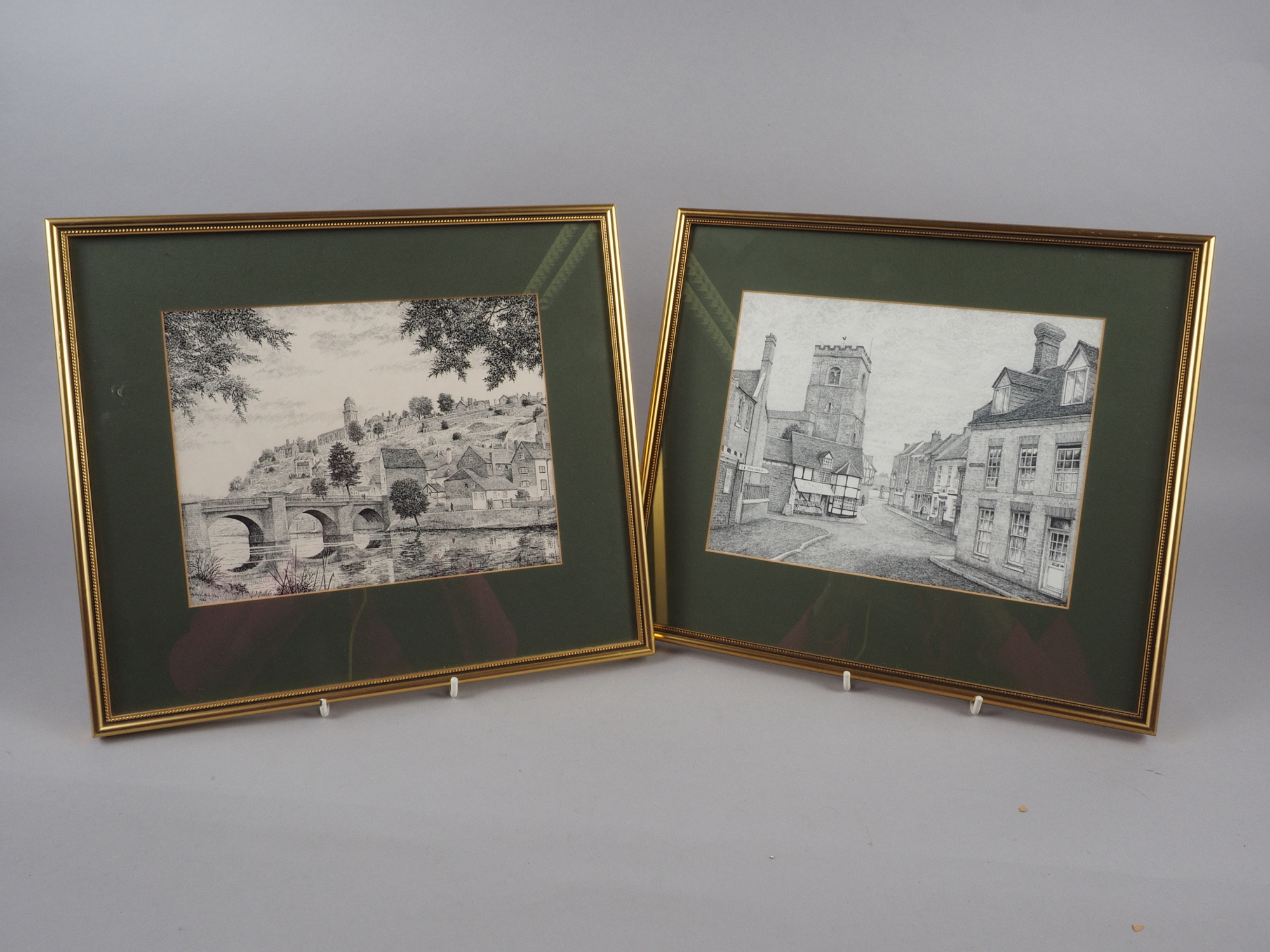 David Brindley: pen and ink drawings, Bridgnorth and a street scene, both 7 1/2" x 9 1/2", in gilt