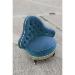 A late 19th century shape back chair, button upholstered in a blue velvet, on fluted supports