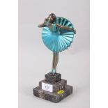 A painted blue metal Art Deco figure of a girl with a windblown skirt, on square stepped base, 9 1/