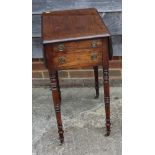 A 19th century mahogany drop leaf work table, fitted two drawers with brass ring handles, on