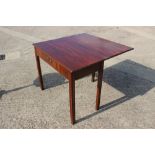 A 19th century mahogany rectangular tea table, fitted one drawer, on shaped and chamfered