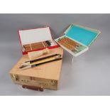 A Winsor & Newton Artist's travelling easel and box and a collection of Oriental calligraphy brushes