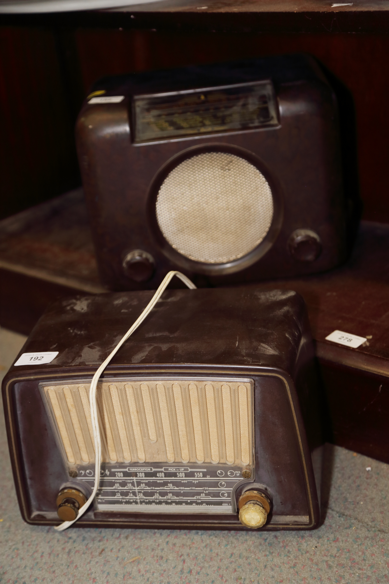 A Bush DAC90A mains radio, in brown Bakelite case, and a similar radio