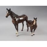 Two Beswick china horses, larger 11" high