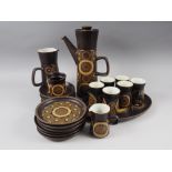 A 1970s Denby "Arabesque" pattern brown glazed coffee set (coffee pot lid damaged)