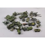 An assortment of Dinky military vehicles, all well played with