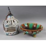 A majolica shallow fruit bowl, on paw feet, 10 1/2" dia, and a Chinese pottery birdcage