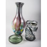 A Whitefriars black streaky design vase, a green controlled bubble design ashtray and a modern