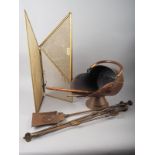 A copper coal scuttle, fire irons, two toasting forks and a brass fire screen