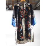 A Chinese silk Mandarin style jacket with embroidered figure and floral designs, 40 1/2" approx from