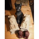 Two cast resin models of lions, on plinths, a smaller pair of Dogs of Fo and a hardstone model of