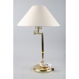 A brass adjustable table lamp, 19" high, a copper cocktail shaker with planished decoration, a