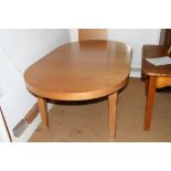 A modern cherrywood oval extending dining table with extra leaf, on square taper supports, top 19" x
