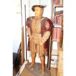 A carved and painted wood figure of Henry VIII, on plinth base, 64" high