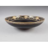 A Royal Worcester china shallow fruit bowl, decorated in black and gilt, and a black decorated