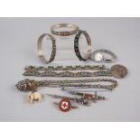 A Continental silver and turquoise set bracelet, four other white metal and stone set bracelets, a
