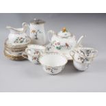 A Tuscan china "Plant" pattern teaset, manufactured for Harrods (missing one teacup)