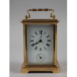 A French brass cased carriage clock with alarm